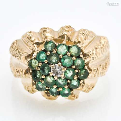 A 9KG Emerald and Diamond Ring