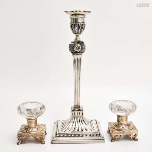 A Silver Candlestick and A Pair of Salt Cellars