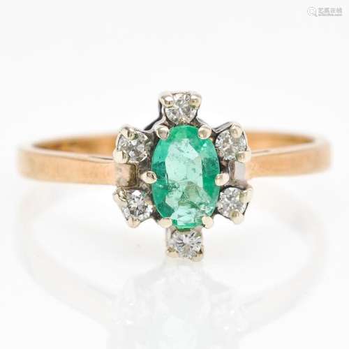 A 9KG Emerald and Diamond Ring