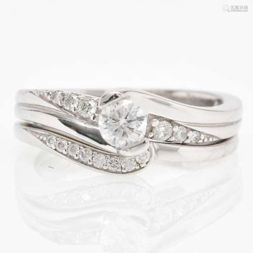 A 14KWG Diamond Engagement and Wedding Band