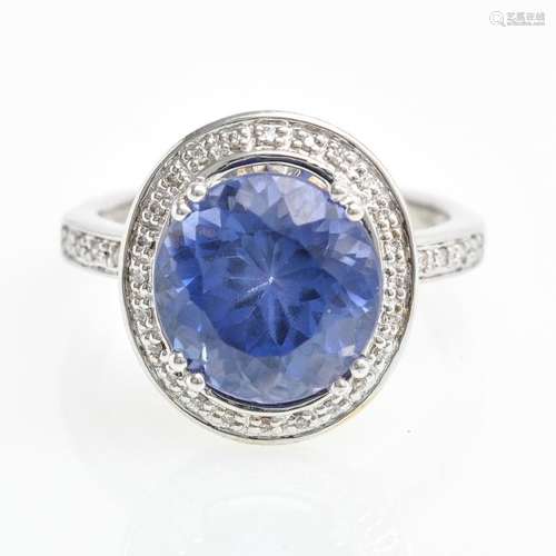 An 18KWG Ladies Diamond and Sapphire Ring