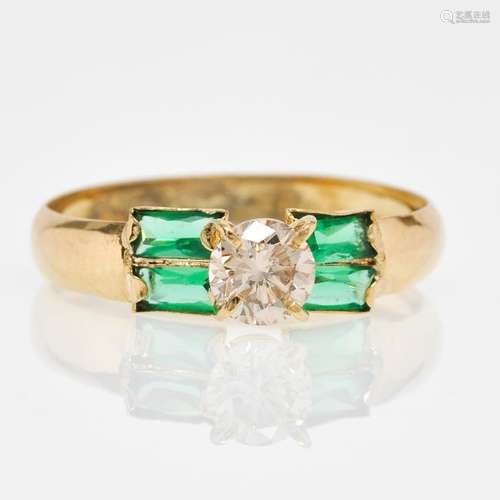 A 14KG Emerald and Diamond Ring