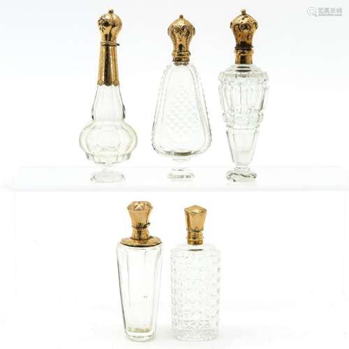 A Collection of 19th Cent. Scent Bottles with Gold Tops