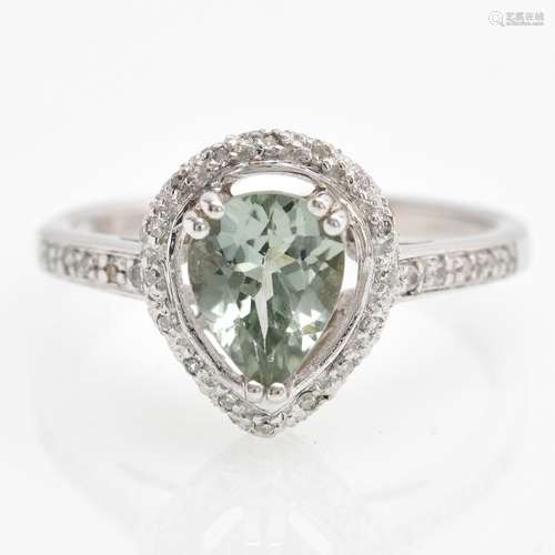 A 9KWG Ladies Tourmaline and Diamond Ring