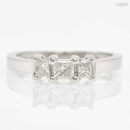 A 10KWG Diamond Ring with Three Princess Cut Diamonds