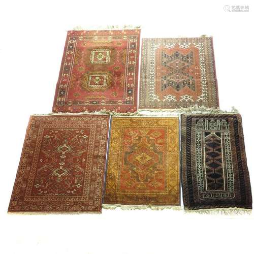 A Collection of Five Carpets