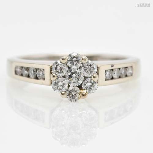 A 10KWG Ladies Diamond Ring Approximately 0.56 CTW