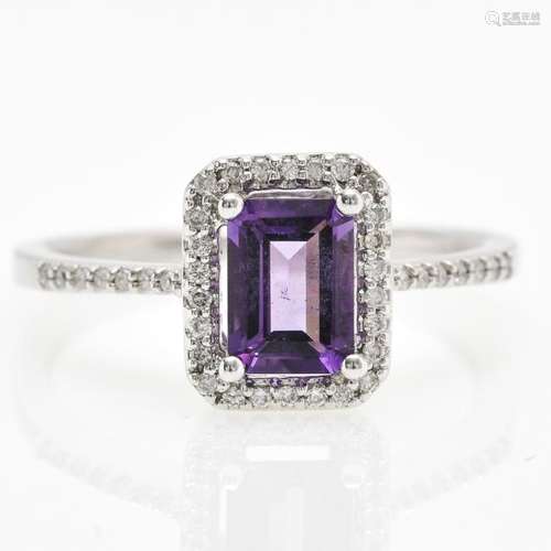 A 9KG Ladies Amethyst and Diamond Ring