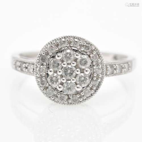 A 10KWG Ladies Diamond Ring Approximately 0.55 CTW