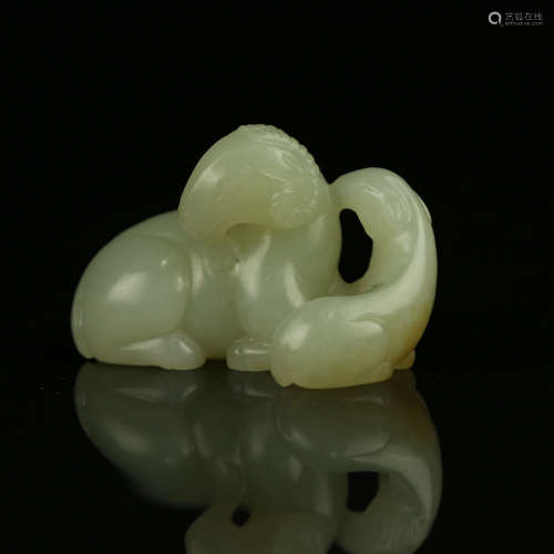 A Chinese Carved Jade Foo-Dog
