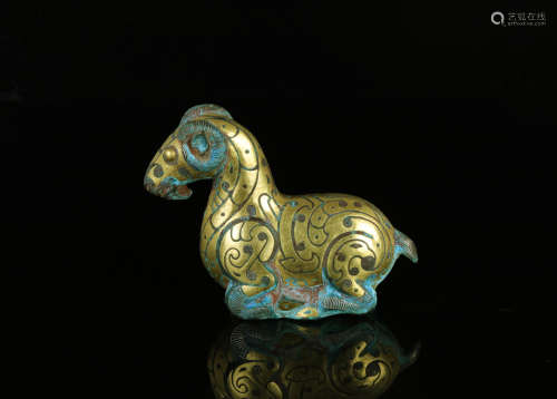 A Chinese Bronze Goat with Gold Inlaided