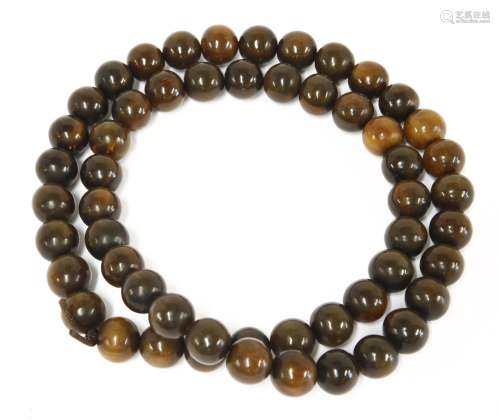 A Chinese rhinoceros horn bead rosary