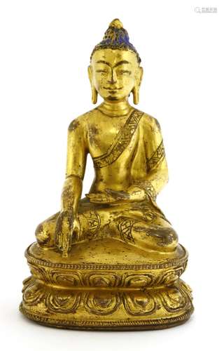 A Tibetan gilt bronze Shakyamuni