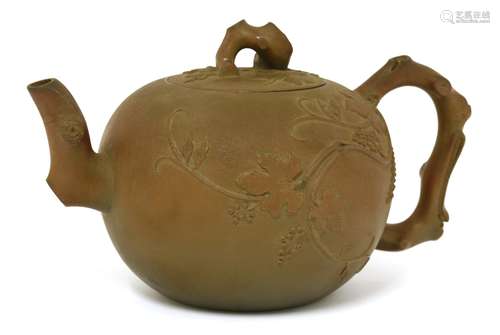 A Chinese Yixing zisha teapot and cover