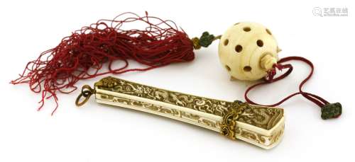 A Chinese ivory compass and a ball