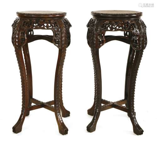 A pair of Chinese hardwood jardinière stands
