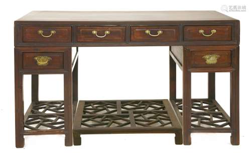 A Chinese padouk wood pedestal desk