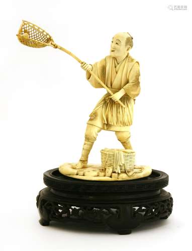 A Japanese ivory okimono