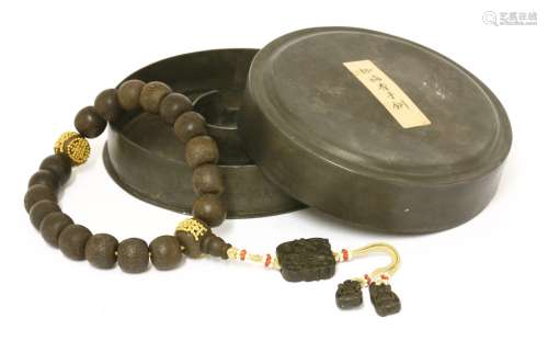 A Chinese wooden bead rosary