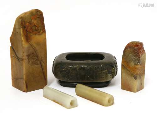 Four soapstone seals and a brush washer