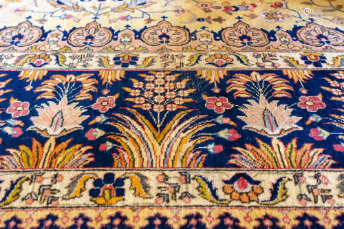 A TABRIZ CARPET, NORTHWEST PERSIA 伊朗褐底饰花形纹饰羊毛毯
