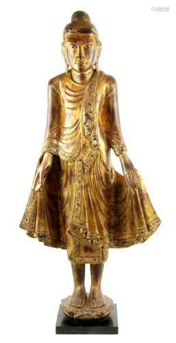 A Burmese gilt wood standing Buddha