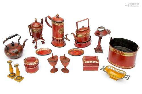 A collection of red and yellow tole peinte miniature objects