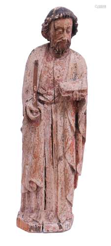 A polychromed limewood sculpture of Saint Peter