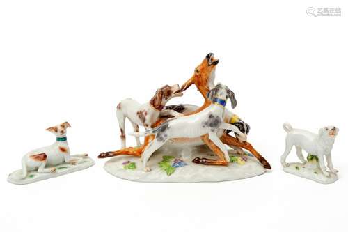 Three Meissen porcelain figures of dogs and deer