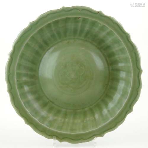 A celadon glazed charger