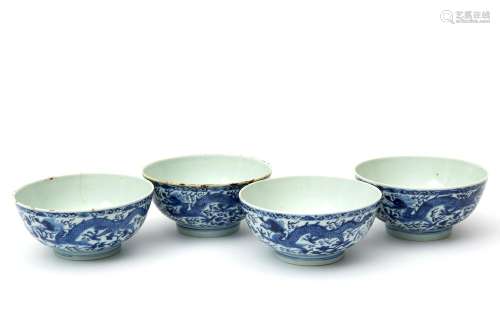 Four blue & white dragon bowls