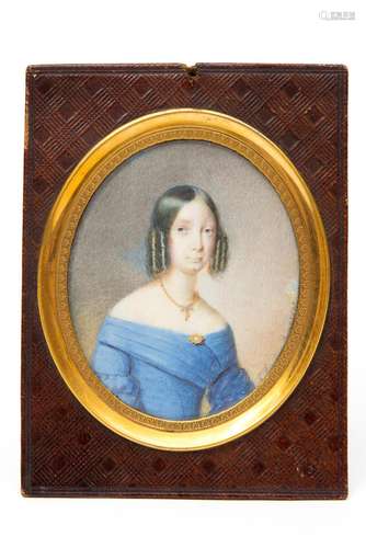 A portrait miniature of a lady in a blue frock