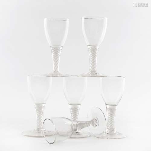 A set of six glasses with twisted opaque stems