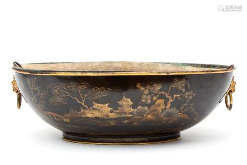 A black and gilt tole peinte oval jardinière