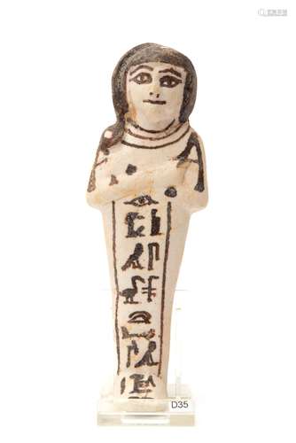 An Egyptian white faience Ushabti