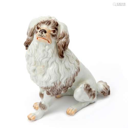 A Meissen porcelain seated Poodle dog figure