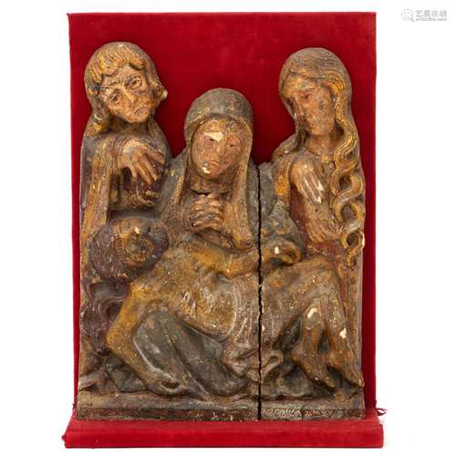 A polychromed wood sculpture of a Pietà