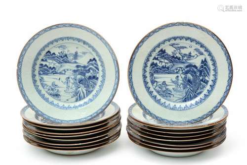 A set of eighteen blue & white plates with relief molded borders