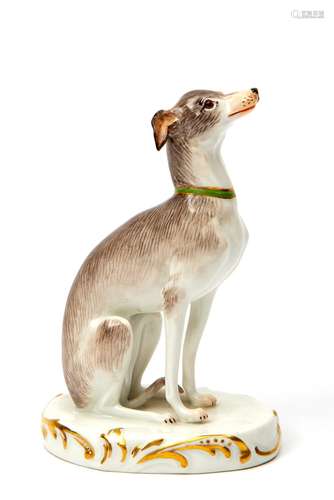 A Meissen porcelain seated whippet/greyhound dog figure