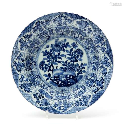 A large blue & white charger plate