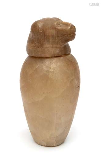 An Egyptian alabaster canopic jar