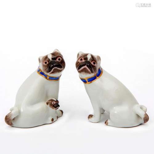 Two Meissen porcelain pug dog small figures