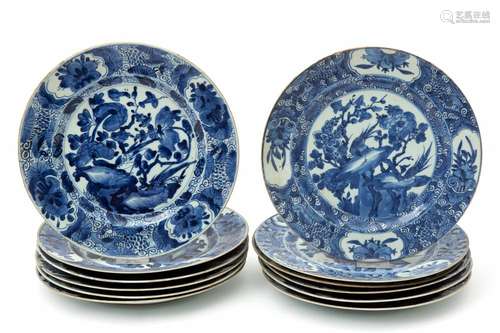 A set of 12 large blue & white plates