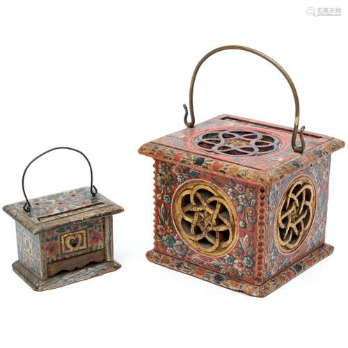 Two Hindeloopen polychromed wooden stoves