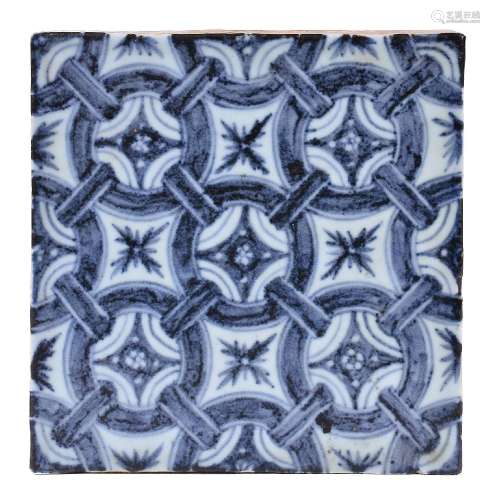A Chinese square porcelain floor tile with underglaze blue decoration