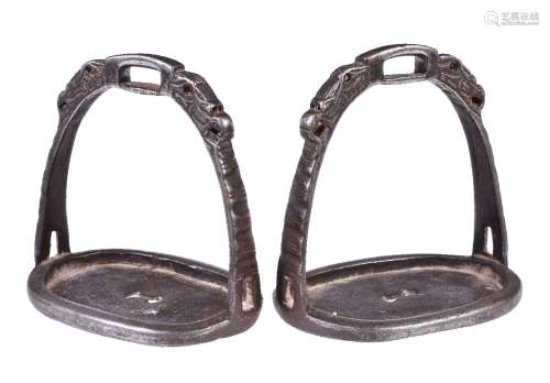 A pair of Chinese white metal stirrups