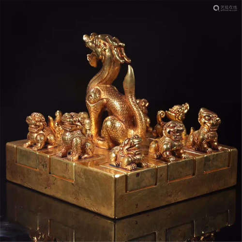 A SET OF CHINESE GILT BRZONE DRAGON SEALS