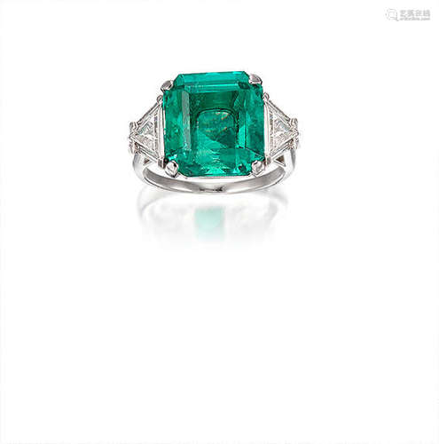 An Emerald and Diamond Ring