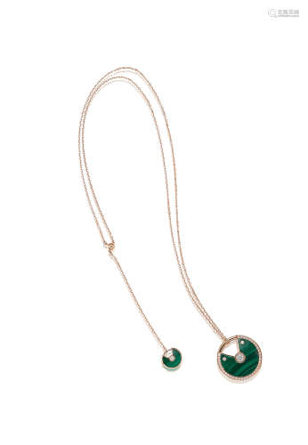 A Malachite and Diamond 'Amulette de Cartier' Pendant Necklace, by Cartier