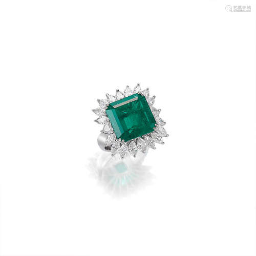 An Emerald and Diamond Ring